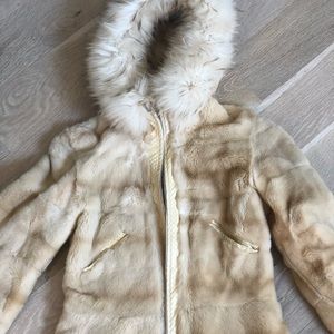 Mink coat. With fox hood details and snake.